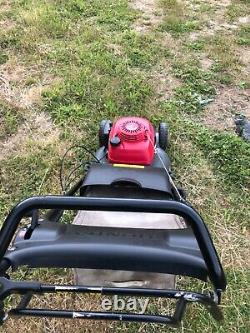 Honda 476 QXE self propelled lawn mower / rear roller model with blade stop