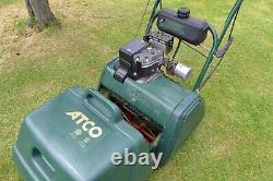 Lawn mower self propelled cylinder with roller plus scarifier