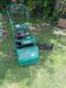 Qualcast Classic 35S Petrol Self Propelled mower with a scarifier cassette